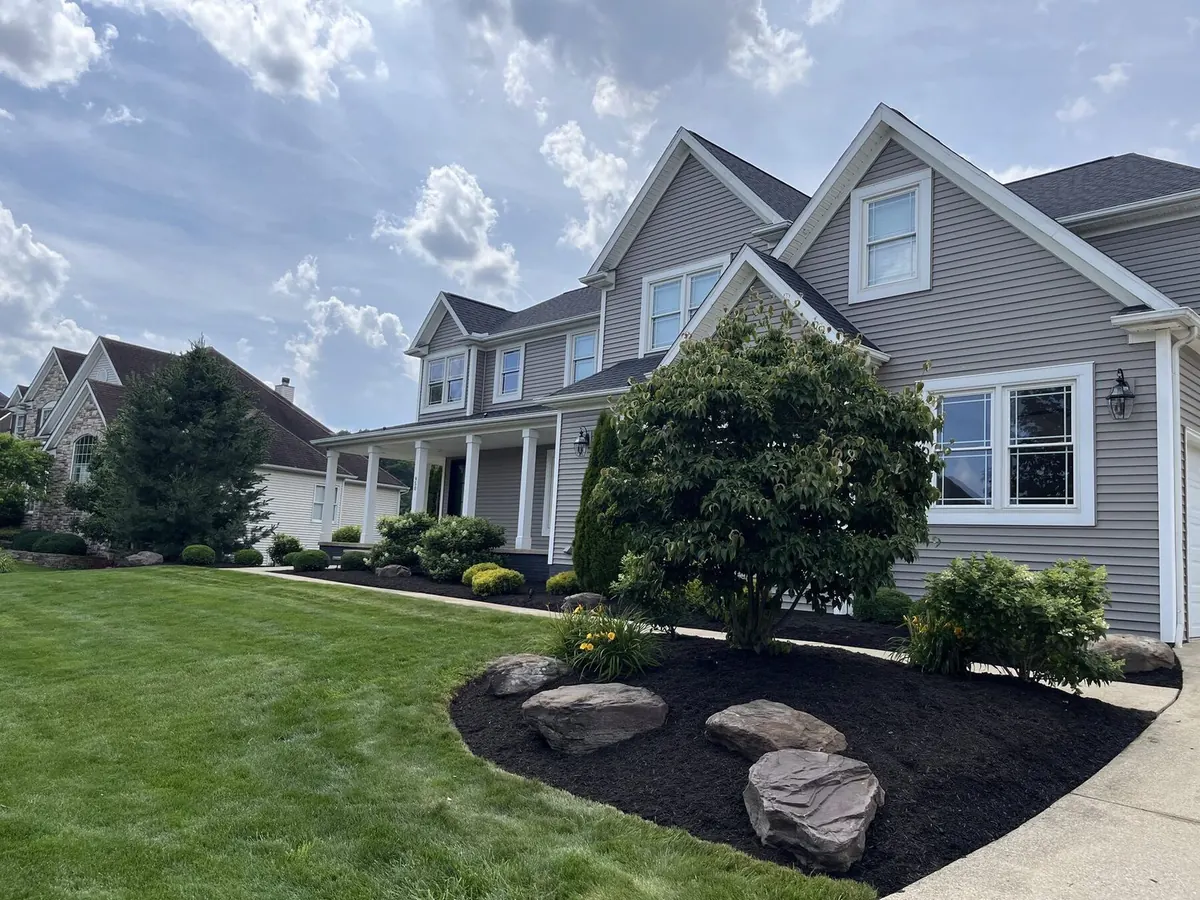 Lush green Ohio lawn after weekly cut