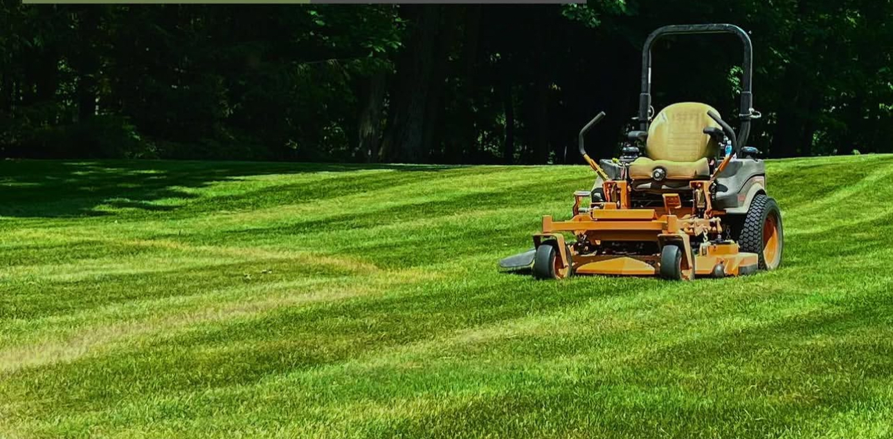 Scag zero-turn mower on a freshly striped Northeast Ohio lawn